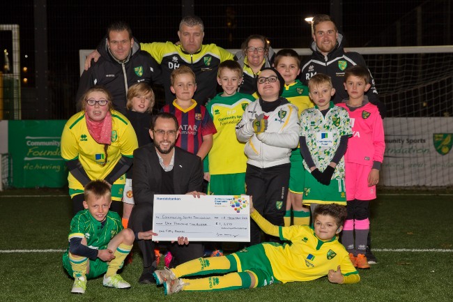 Ashtons Charitable Trust present cheque to Community Sports Foundation